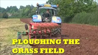 PLOUGHING THE GRASS FIELD