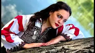 Cuvam ovce u livadi dole (Я забочусь об овцах на лугу внизу)