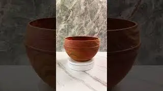 A bowl with slightly warped edges #woodturning