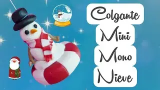 Colgante Mini Mono de Nieve hecho a mano con Pasta Flexible o Porcelana Fr&iacute;a. 