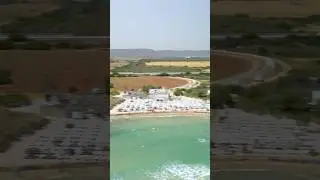 Lido Morelli Beach 🇮🇹 | Drone Floating over Clear Water