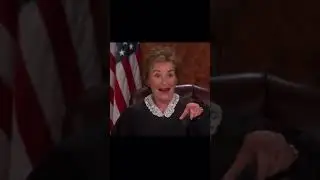 Judge Judy laughs with defendant