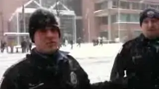Cops explaining their breakup of the snowball fight at 14th and U St.
