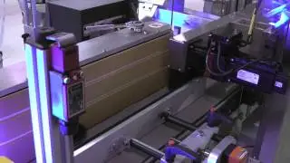 Quadrel | Labeling Systems | High Speed Labeling System for Paint Cans