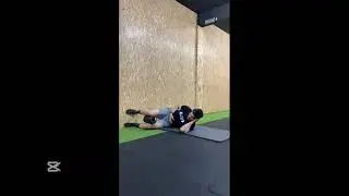 Left side lying breathing w/ foam roller & hip shifts 