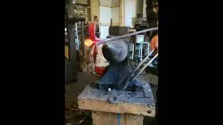 Blacksmithing- The forging of a flower.