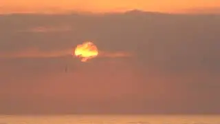 sunrise  time lapse ...yellow to white...