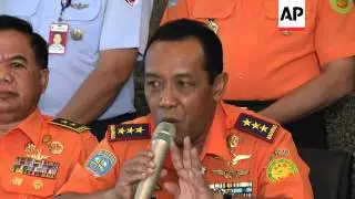Chief of rescue agency say divers retrieve one black box from crashed AirAsia flight