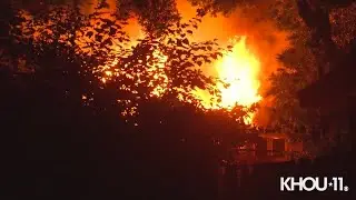 Raw Video: Firefighter rescued after roof collapse, mayday call during house fire