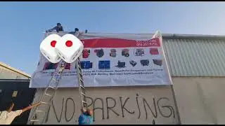 flex fixing/ wallpaper fixing/ sticker fixing by Titans group in dubai for contact 00971505659123