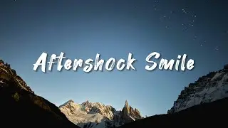 Aftershock Smile &mdash; a cinematic emotional pop anthem about resilience, healing.