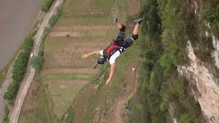 Global BASE jumpers soar over Yunnan canyon during May Day holiday