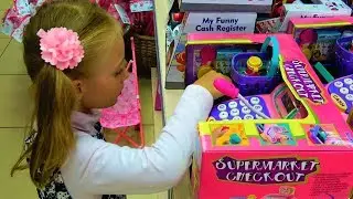 Funny Kids Shopping in the Supermarket