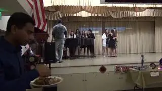 Aditi playing piano and singing 