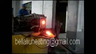 Induction forging by medium frequency induction heating machine