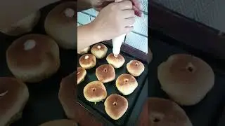 Homemade ensaymada with cream cheese filling