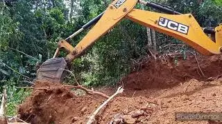 construction a new road to the beach jcb 3dx super
