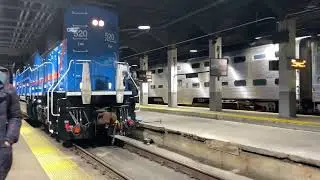 Metra SD70MACH number 520 hooking up to cars