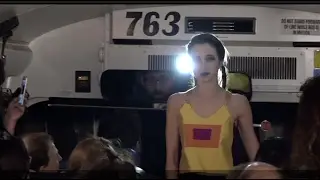 Artist makes NY fashion week debut... on a bus