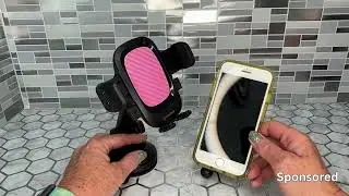 This Car mount holds phone securely in place & Adjusts easy