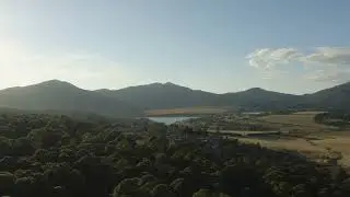 Panorama around a Forest with a lake of a Village