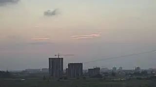 Dipping between two Buildings - A Beautiful Sunset