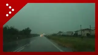 Marche, temporale in serata: camera car verso Senigallia