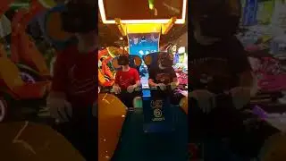 Ty and josh in an arcade enjoying a VR roller coaster