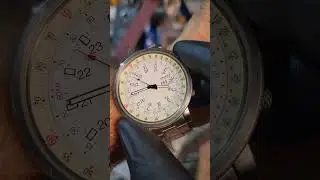Orient Titanium Automatic Slide Rule watch with English and Spanish days