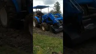 How to get your tractor out of a mud hole #stuck #homesteading #tractor