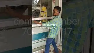 Aluminium glass partition door.. At medical shop..