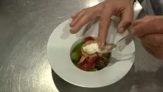 Dick Middelweerd prepares a lobster dish at 2 Michelin star De Treeswijkhoeve