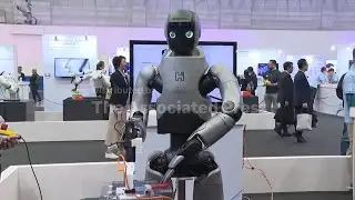 Humanoid coffee making robots and affordable EVs on show at Taipei tech show
