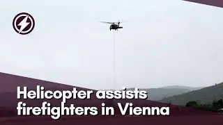 Austrian army helicopter assists firefighters in securing dam west of Vienna