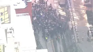 Rally for Justice marches across Brooklyn Bridge into Manhattan on MLK Jr. Day