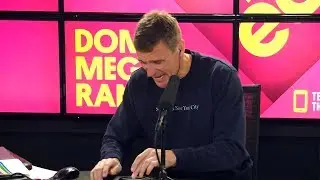 Dom kicks Randell off the desk and makes a fool of himself on-air