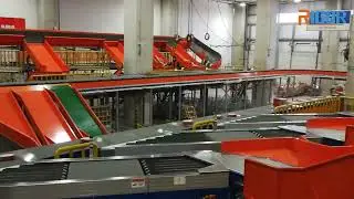 Cross-belt sorter for Cainiao distribution center. #sorter #conveyorsystems #conveyorsolutions