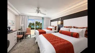Bright Tropical Guestroom with Floor-to-Ceiling Windows at The Palms Hotel & Spa Miami Beach