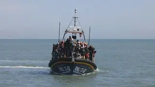 Migrants arrive in Dover after crossing the English Channel by boat | AFP