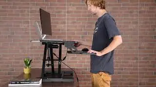 FEZIBO Electric Standing Desk Converter 34 inch Black Height Adjustable Stand Up Power Riser