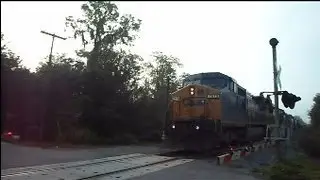 CSX Mixed Long Freight Train Trucking Along