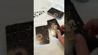 black and gold tarot deck with keywords for beginners