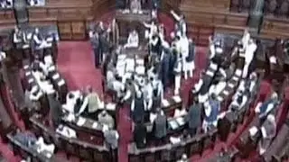 Opposition MPs raise slogans in Rajya Sabha, storm the well