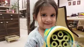 Bella and Vienna playing with The Bubbleblaster