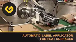 Automatic label applicator for flat surfaces