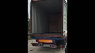 Loading lumber in container
