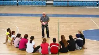 Listening to Gym Coach- Stock Video