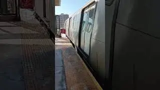 R211A A Train arrives beach 25th st