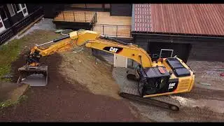 Cat 323E with engcon Tiltrotator