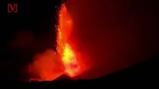 Mount Etna Erupts Casting Bright Red Lava and Billowing Ash Into the Air
